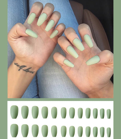 Complete acrylic press on nails kit with glue and application tools.