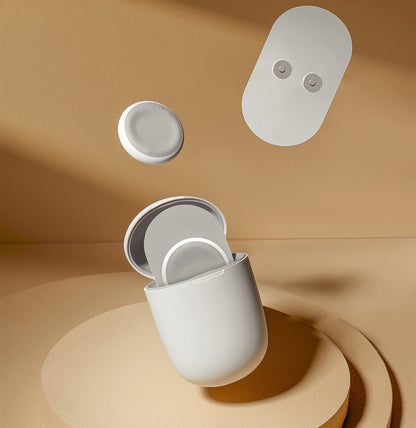 Electric massage pad wireless TENS machine in white with adhesive patches