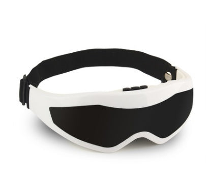 Person using heated eye mask for dry eyes to relieve digital eye strain