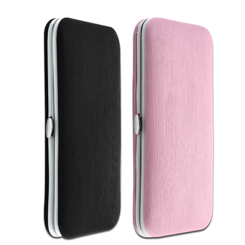 Complete set of manicure tools including nail clippers, files, cuticle pushers and scissors.