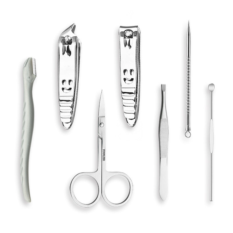 Stainless steel nail clipper from 15-piece manicure set with ergonomic handle.