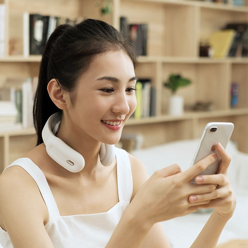 Wireless neck massager with heat in white color showing ergonomic design