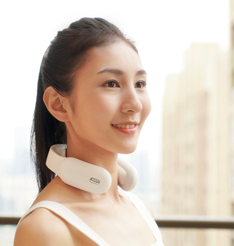 Neck massager with heat providing tension headache relief to user